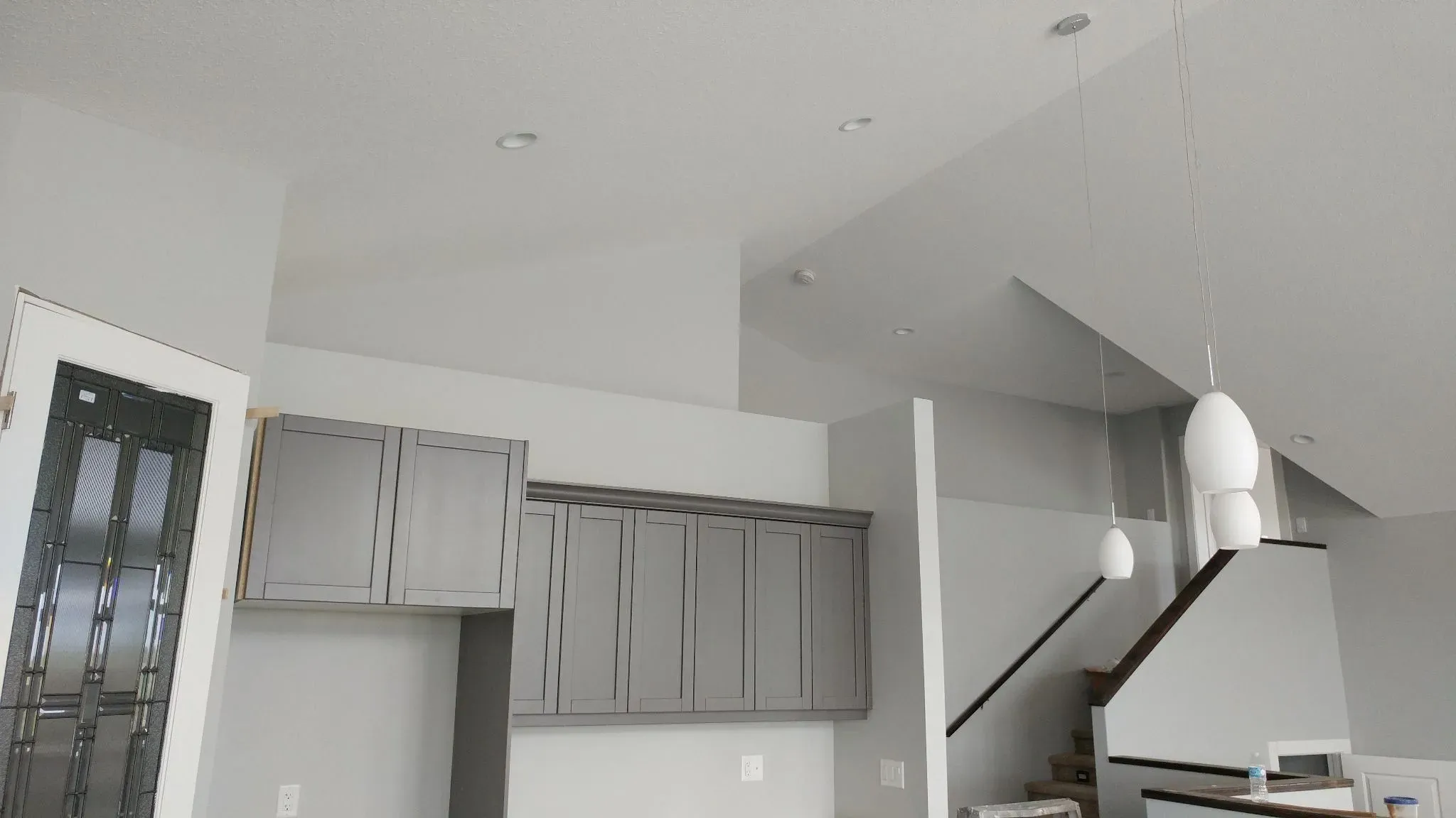Finished kitchen with smooth painted walls and ceiling