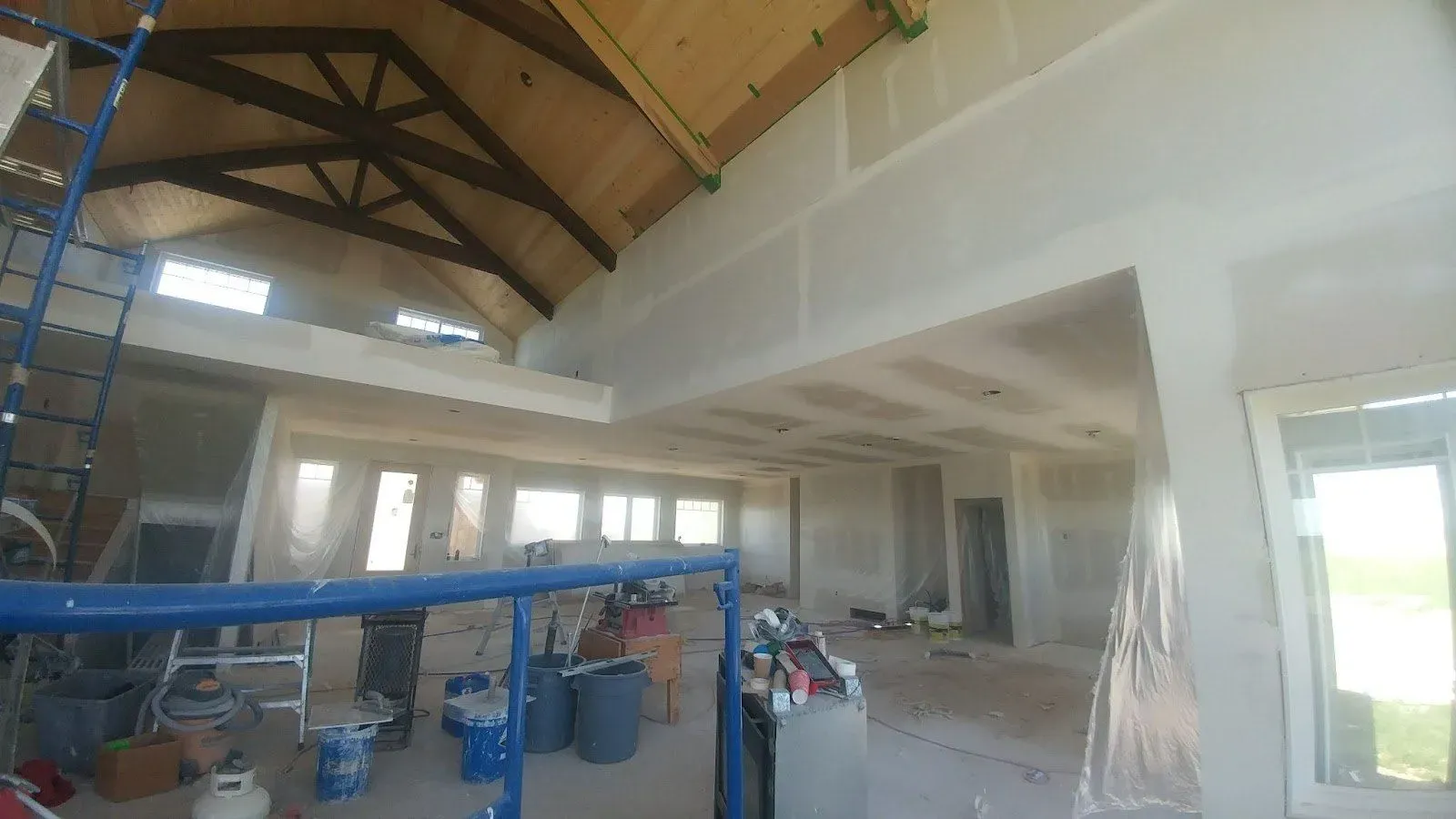 Drywall lift and staging on a large commercial job site
