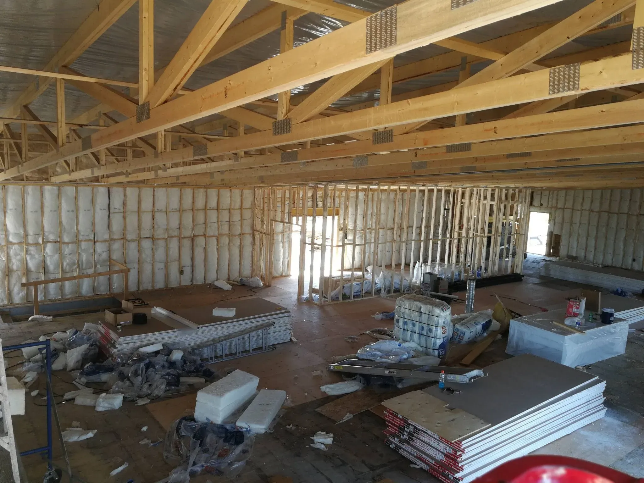 Large steel-stud commercial space boarded and ready for finishing