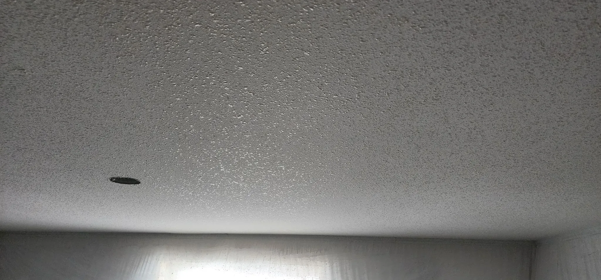 Splatter ceiling texture close-up